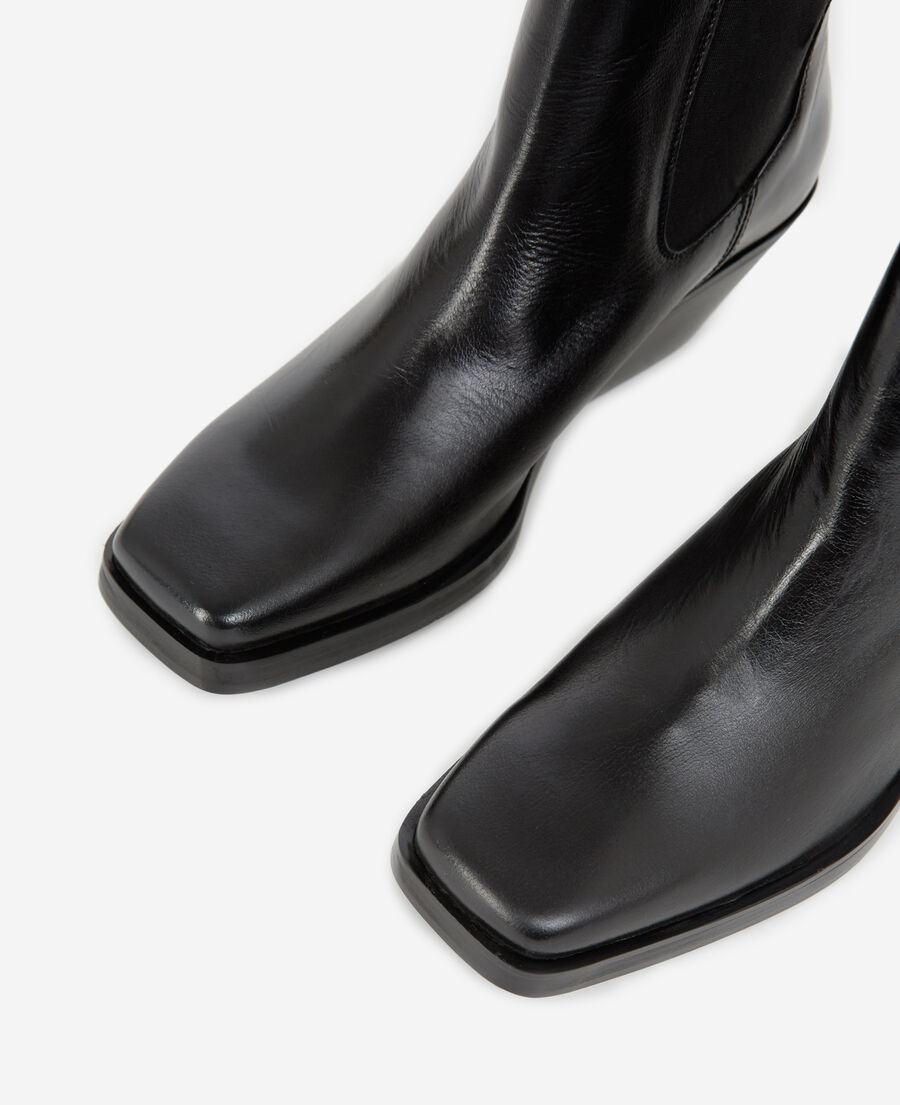 black leather ankle boots with flat sole