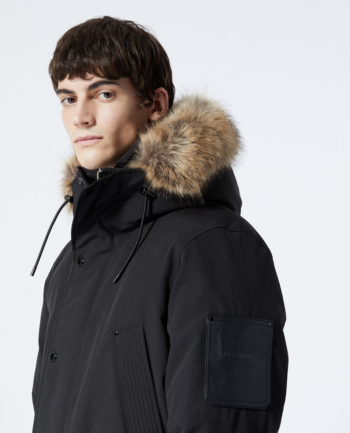Long black parka with leather detail