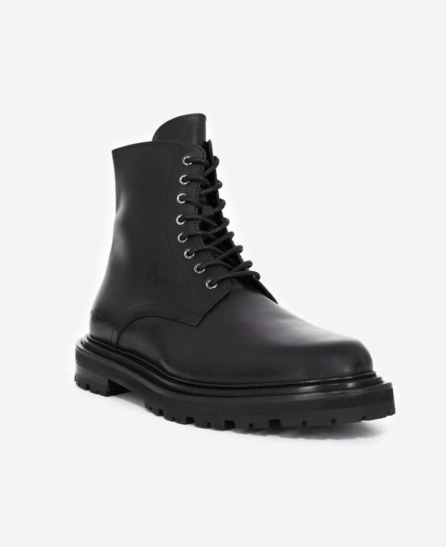 boots en cuir noir à semelle épaisse
