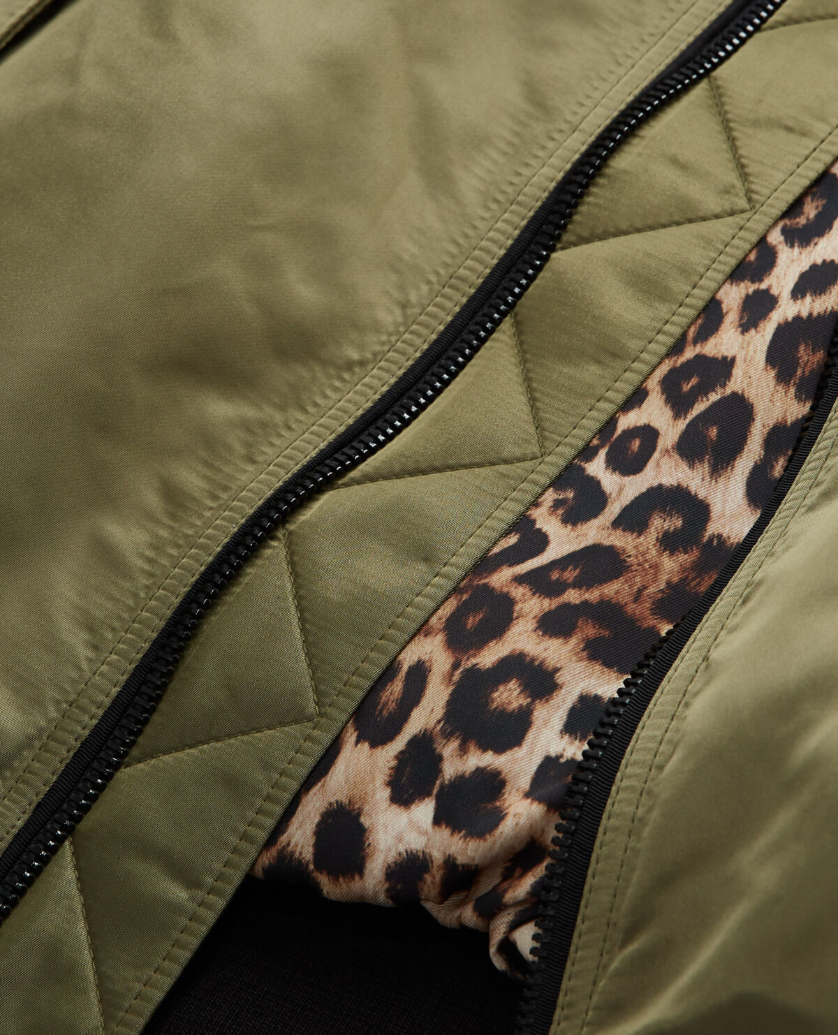 Khaki bomber jacket with leopard lining