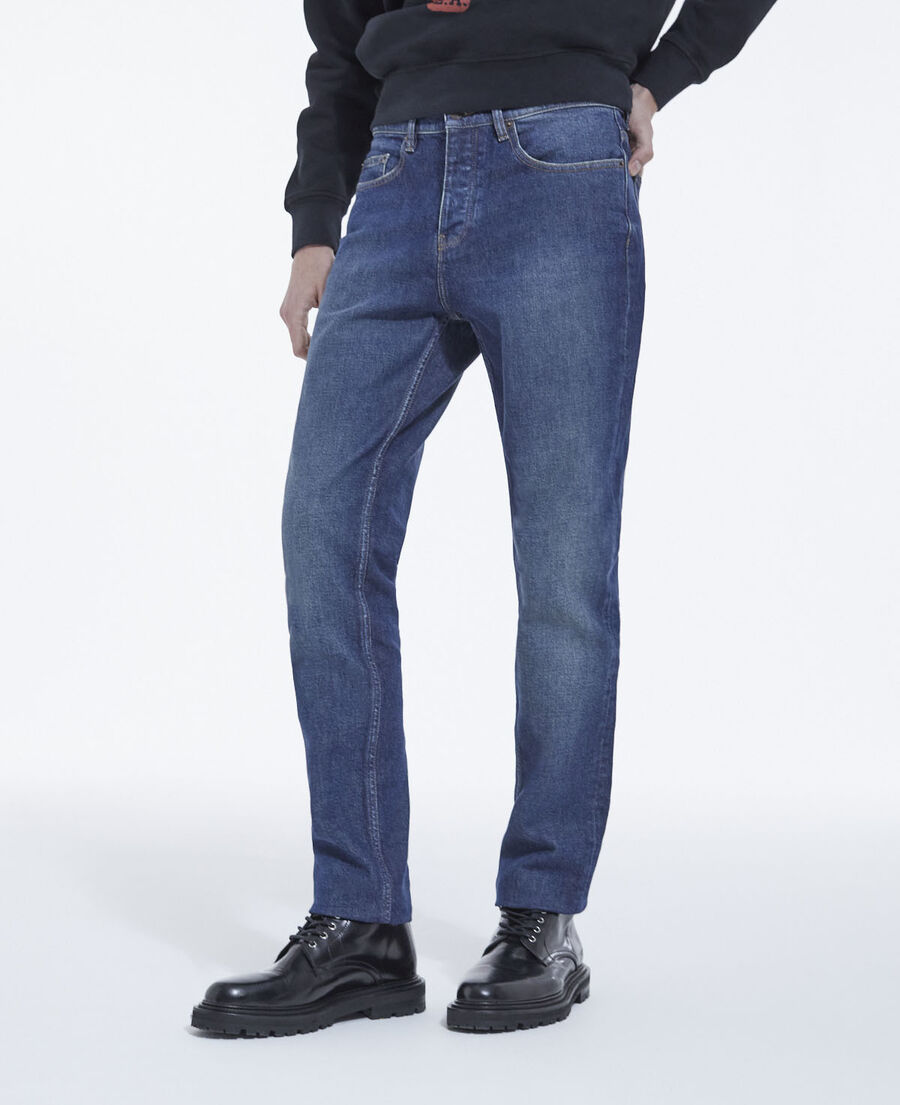 blue slim-fit faded jeans with five pockets