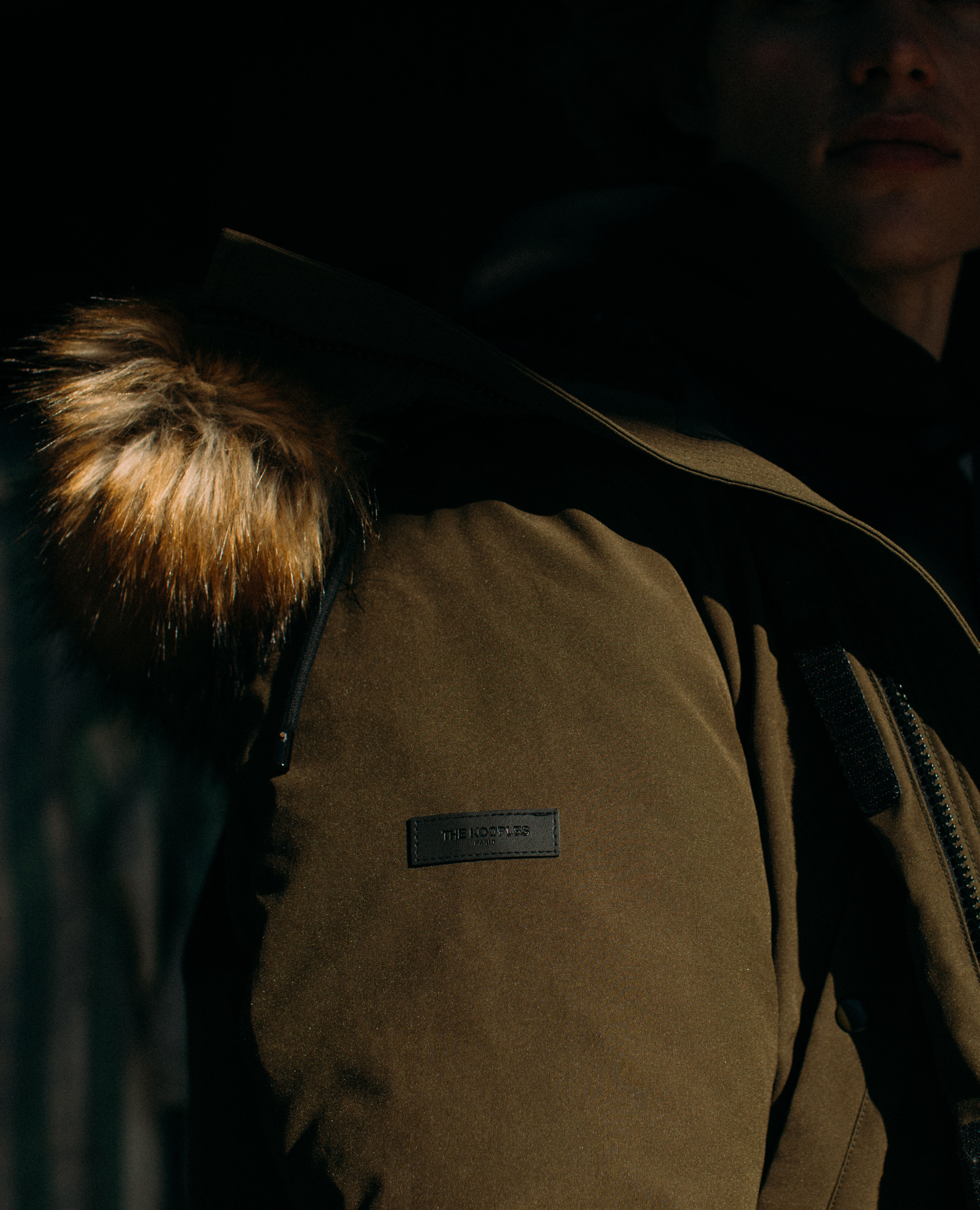PARKA WITH CONTRASTING COLOURS AND FAKE FUR IN THE HOOD The
