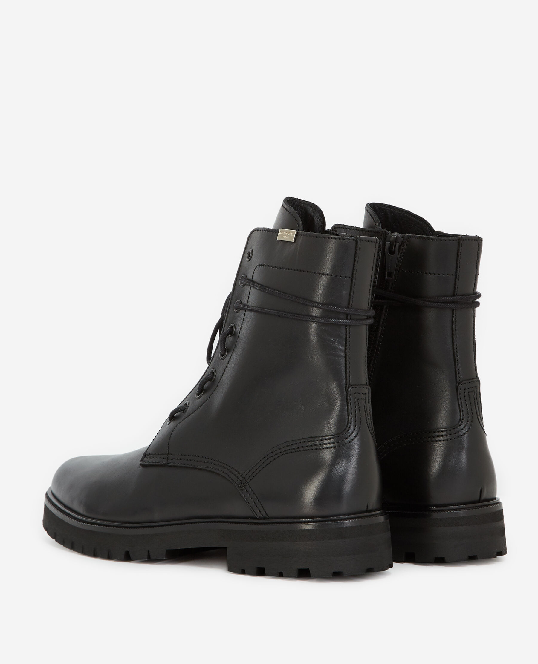 Black boots in leather with side lace detail
