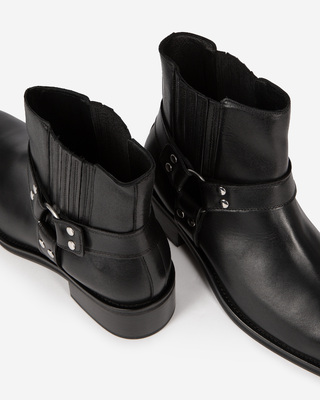 Black leather ankle boots with straps