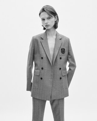 Double-breasted wool suit jacket with camel coat of arms