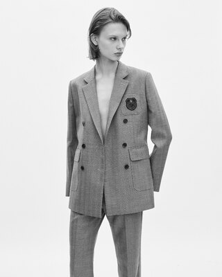 Double-breasted wool suit jacket with camel coat of arms