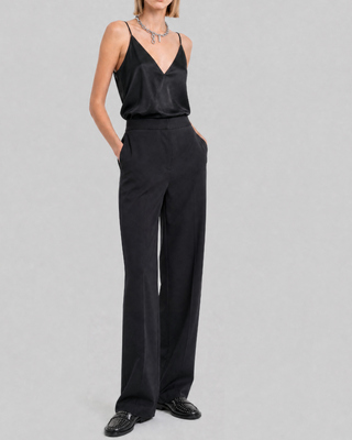 Pantalones anchos de sat&eacute;n negro