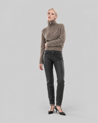 Vaqueros slim con efecto recubierto en negro