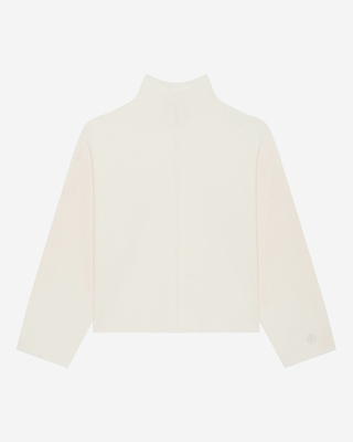 Jersey con cuello de chimenea de color crudo