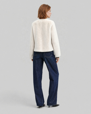 Manteau en fausse fourrure ecru
