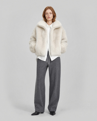 Manteau en fausse fourrure col montant ecru