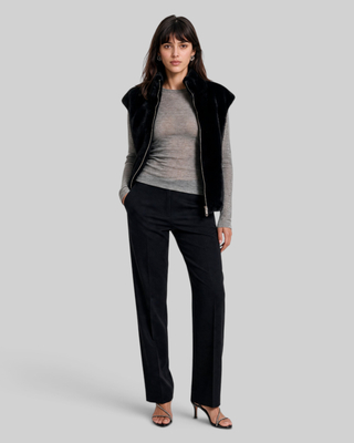 Manteau sans manches en fausse fourrure noir