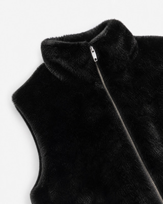 Manteau sans manches en fausse fourrure noir