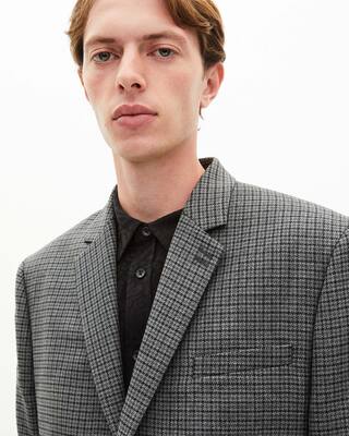 Black and grey houndstooth suit jacket