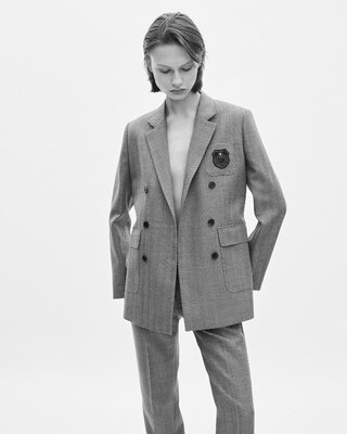 Double-breasted wool suit jacket with camel coat of arms