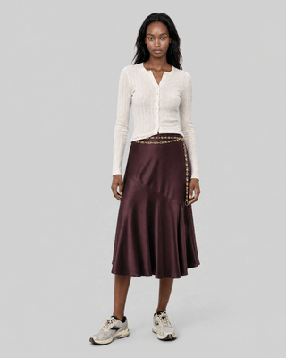 Satin midi skirt with a brown and gold chain